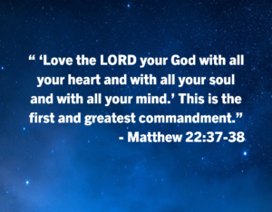Inspirational image with Bible verse Matthew 22:37-38 in bold white text over a starry blue night sky.